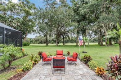 STUNNING POOL HOME located in the prestigious Lake Jovita Golf on Lake Jovita Golf and Country Club in Florida - for sale on GolfHomes.com, golf home, golf lot