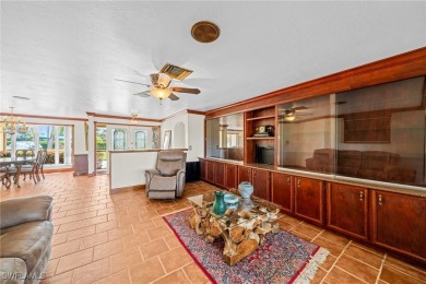 Charming 3BR/3BA Home with Golf & Lake Views - Prime Location! on Spanish Wells Golf and Country Club in Florida - for sale on GolfHomes.com, golf home, golf lot
