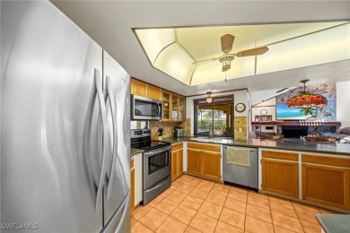 Charming 3BR/3BA Home with Golf & Lake Views - Prime Location! on Spanish Wells Golf and Country Club in Florida - for sale on GolfHomes.com, golf home, golf lot