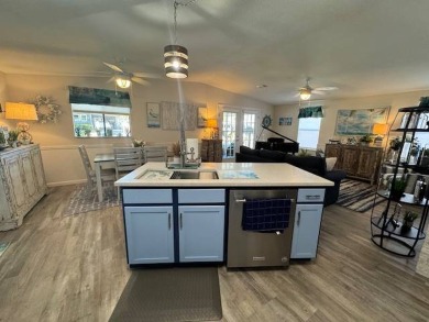 Experience the epitome of stylish living in this stunning, fully on Water Oak Country Club Estates in Florida - for sale on GolfHomes.com, golf home, golf lot