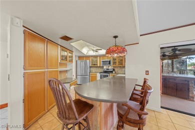 Charming 3BR/3BA Home with Golf & Lake Views - Prime Location! on Spanish Wells Golf and Country Club in Florida - for sale on GolfHomes.com, golf home, golf lot