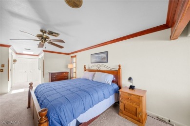 Charming 3BR/3BA Home with Golf & Lake Views - Prime Location! on Spanish Wells Golf and Country Club in Florida - for sale on GolfHomes.com, golf home, golf lot