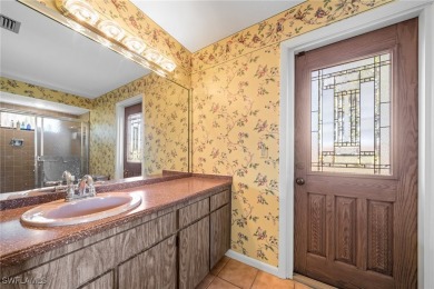 Charming 3BR/3BA Home with Golf & Lake Views - Prime Location! on Spanish Wells Golf and Country Club in Florida - for sale on GolfHomes.com, golf home, golf lot