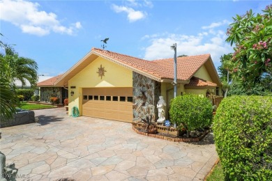 Charming 3BR/3BA Home with Golf & Lake Views - Prime Location! on Spanish Wells Golf and Country Club in Florida - for sale on GolfHomes.com, golf home, golf lot