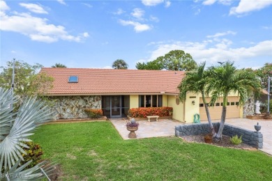 Charming 3BR/3BA Home with Golf & Lake Views - Prime Location! on Spanish Wells Golf and Country Club in Florida - for sale on GolfHomes.com, golf home, golf lot