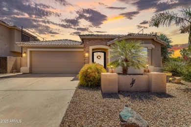 This single level home in The Villages at Queen Creek sits on a on Las Colinas Golf Club in Arizona - for sale on GolfHomes.com, golf home, golf lot