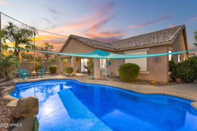 This single level home in The Villages at Queen Creek sits on a on Las Colinas Golf Club in Arizona - for sale on GolfHomes.com, golf home, golf lot