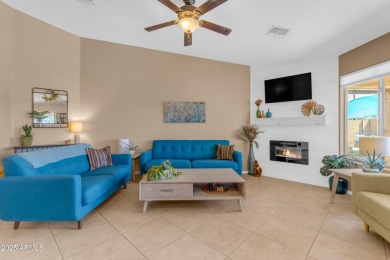 This single level home in The Villages at Queen Creek sits on a on Las Colinas Golf Club in Arizona - for sale on GolfHomes.com, golf home, golf lot