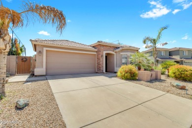 This single level home in The Villages at Queen Creek sits on a on Las Colinas Golf Club in Arizona - for sale on GolfHomes.com, golf home, golf lot