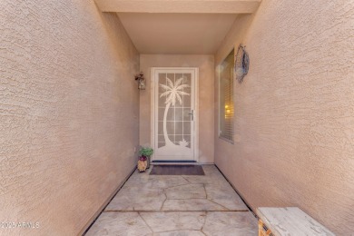 This single level home in The Villages at Queen Creek sits on a on Las Colinas Golf Club in Arizona - for sale on GolfHomes.com, golf home, golf lot