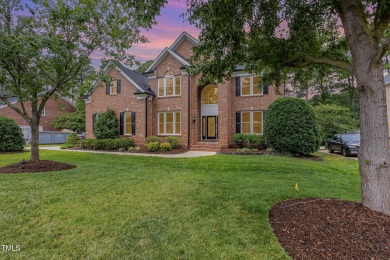 The heart of the home is a gorgeous custom kitchen with sleek on Brier Creek Country Club in North Carolina - for sale on GolfHomes.com, golf home, golf lot