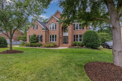 The heart of the home is a gorgeous custom kitchen with sleek on Brier Creek Country Club in North Carolina - for sale on GolfHomes.com, golf home, golf lot