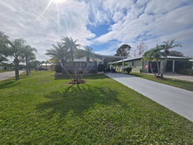 This beautifully furnished 1,344 sq. ft. home offers comfort and on Spanish Lakes Country Club in Florida - for sale on GolfHomes.com, golf home, golf lot