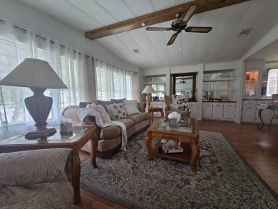 This beautifully furnished 1,344 sq. ft. home offers comfort and on Spanish Lakes Country Club in Florida - for sale on GolfHomes.com, golf home, golf lot