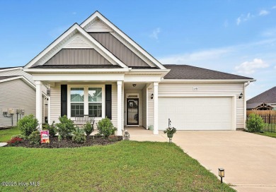 Welcome to this beautifully maintained coastal cottage located on Carolina National Golf Club in North Carolina - for sale on GolfHomes.com, golf home, golf lot