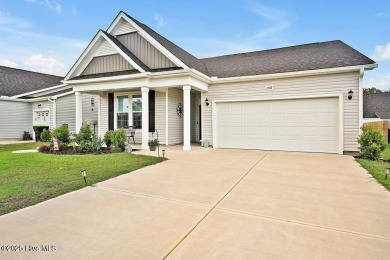 Welcome to this beautifully maintained coastal cottage located on Carolina National Golf Club in North Carolina - for sale on GolfHomes.com, golf home, golf lot