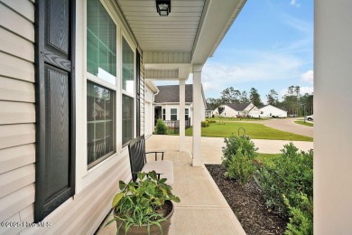 Welcome to this beautifully maintained coastal cottage located on Carolina National Golf Club in North Carolina - for sale on GolfHomes.com, golf home, golf lot