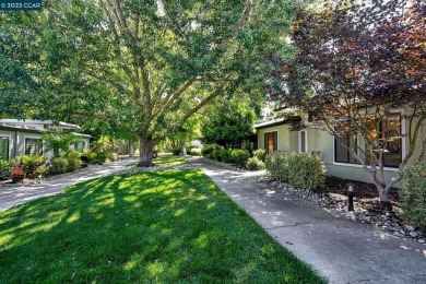 Discover this lovely Golden Gate model level in Rossmoor on Rossmoor Golf Course in California - for sale on GolfHomes.com, golf home, golf lot
