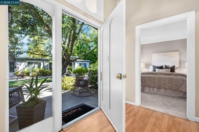 Discover this lovely Golden Gate model level in Rossmoor on Rossmoor Golf Course in California - for sale on GolfHomes.com, golf home, golf lot