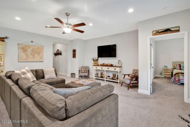 Welcome to this beautifully maintained coastal cottage located on Carolina National Golf Club in North Carolina - for sale on GolfHomes.com, golf home, golf lot