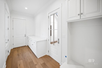 New Hardwood Flooring throughout in this Popular Fairhope plan on Lakewood Golf Club in Alabama - for sale on GolfHomes.com, golf home, golf lot