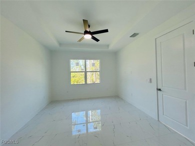 Gorgeous corner lot home. 3 bedrooms 3 full bathrooms, 2 car on Lehigh Resort Club in Florida - for sale on GolfHomes.com, golf home, golf lot