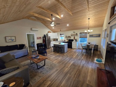 Cozy cabin for the perfect weekend retreat on Greers Ferry Lake on Tannenbaum Golf Club in Arkansas - for sale on GolfHomes.com, golf home, golf lot