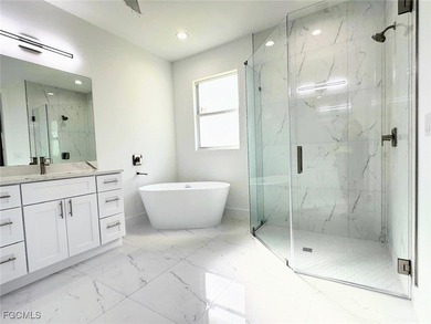 Gorgeous corner lot home. 3 bedrooms 3 full bathrooms, 2 car on Lehigh Resort Club in Florida - for sale on GolfHomes.com, golf home, golf lot