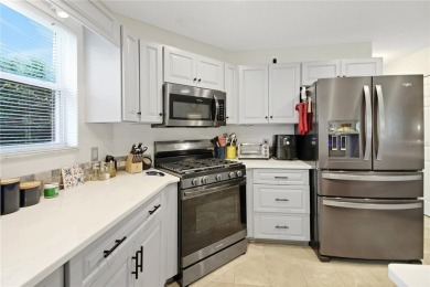 Stunning 2-bedroom, 2-bath home with a den, spacious 2-car on Pennbrooke Fairways in Florida - for sale on GolfHomes.com, golf home, golf lot