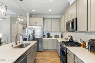 This like new, charming residence, built in 2023 by Bill Clark on Compass Pointe Golf Course in North Carolina - for sale on GolfHomes.com, golf home, golf lot