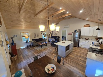 Cozy cabin for the perfect weekend retreat on Greers Ferry Lake on Tannenbaum Golf Club in Arkansas - for sale on GolfHomes.com, golf home, golf lot