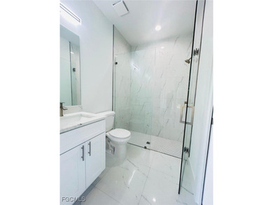 Gorgeous corner lot home. 3 bedrooms 3 full bathrooms, 2 car on Lehigh Resort Club in Florida - for sale on GolfHomes.com, golf home, golf lot