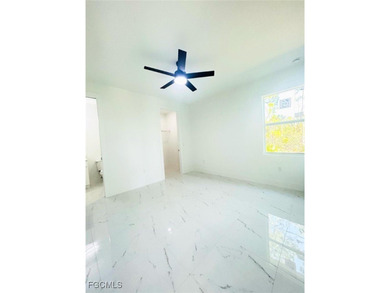 Gorgeous corner lot home. 3 bedrooms 3 full bathrooms, 2 car on Lehigh Resort Club in Florida - for sale on GolfHomes.com, golf home, golf lot