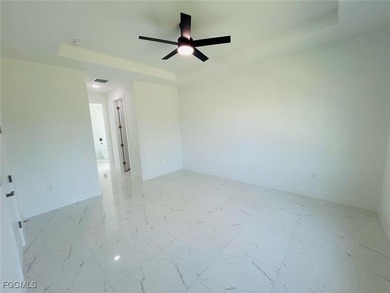 Gorgeous corner lot home. 3 bedrooms 3 full bathrooms, 2 car on Lehigh Resort Club in Florida - for sale on GolfHomes.com, golf home, golf lot