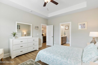 This like new, charming residence, built in 2023 by Bill Clark on Compass Pointe Golf Course in North Carolina - for sale on GolfHomes.com, golf home, golf lot