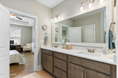 This like new, charming residence, built in 2023 by Bill Clark on Compass Pointe Golf Course in North Carolina - for sale on GolfHomes.com, golf home, golf lot