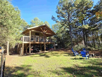 Cozy cabin for the perfect weekend retreat on Greers Ferry Lake on Tannenbaum Golf Club in Arkansas - for sale on GolfHomes.com, golf home, golf lot