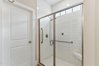 This like new, charming residence, built in 2023 by Bill Clark on Compass Pointe Golf Course in North Carolina - for sale on GolfHomes.com, golf home, golf lot