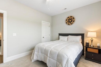 This like new, charming residence, built in 2023 by Bill Clark on Compass Pointe Golf Course in North Carolina - for sale on GolfHomes.com, golf home, golf lot
