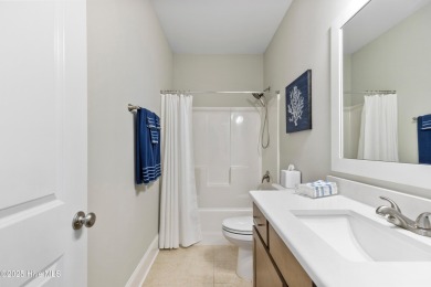 This like new, charming residence, built in 2023 by Bill Clark on Compass Pointe Golf Course in North Carolina - for sale on GolfHomes.com, golf home, golf lot