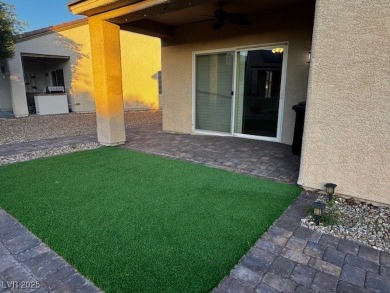 Sun City Aliante home, enjoy sitting on your covered patio with on Aliante Golf Club in Nevada - for sale on GolfHomes.com, golf home, golf lot