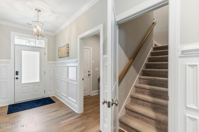 This like new, charming residence, built in 2023 by Bill Clark on Compass Pointe Golf Course in North Carolina - for sale on GolfHomes.com, golf home, golf lot