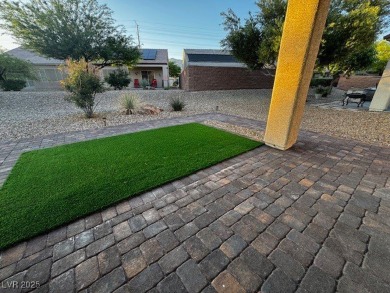 Sun City Aliante home, enjoy sitting on your covered patio with on Aliante Golf Club in Nevada - for sale on GolfHomes.com, golf home, golf lot