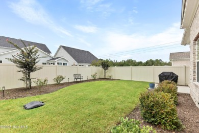 This like new, charming residence, built in 2023 by Bill Clark on Compass Pointe Golf Course in North Carolina - for sale on GolfHomes.com, golf home, golf lot