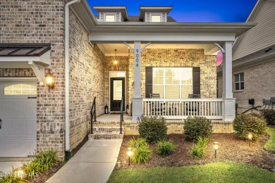This like new, charming residence, built in 2023 by Bill Clark on Compass Pointe Golf Course in North Carolina - for sale on GolfHomes.com, golf home, golf lot