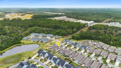 This like new, charming residence, built in 2023 by Bill Clark on Compass Pointe Golf Course in North Carolina - for sale on GolfHomes.com, golf home, golf lot