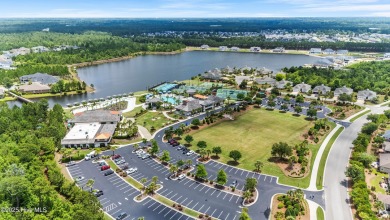 This like new, charming residence, built in 2023 by Bill Clark on Compass Pointe Golf Course in North Carolina - for sale on GolfHomes.com, golf home, golf lot