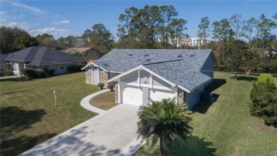 Beautiful, move in a ready canal home in the highly desirable on The Grand Club - Pine Lakes Course in Florida - for sale on GolfHomes.com, golf home, golf lot