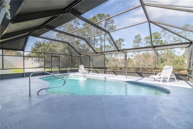 Beautiful, move in a ready canal home in the highly desirable on The Grand Club - Pine Lakes Course in Florida - for sale on GolfHomes.com, golf home, golf lot