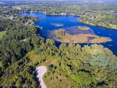 Great Opportunity to Build your Lakefront Dream Home on this on Oak Pointe Country Club in Michigan - for sale on GolfHomes.com, golf home, golf lot